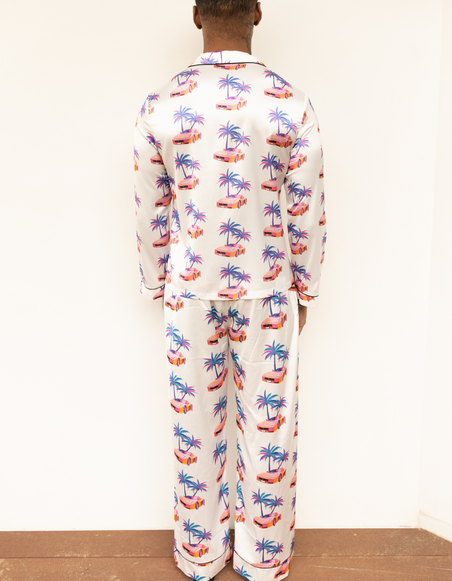 Unisex Satin Pajama Set in Iconic Dirty Weekend Palm Tree and Race Car Pattern